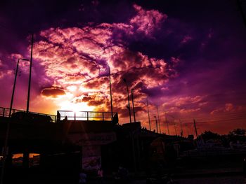 Low angle view of dramatic sky during sunset