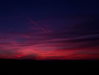 Low angle view of dramatic sky during sunset