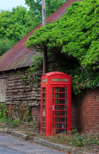Red house against building