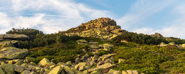 Panoramic view of rocks and mountains against sky