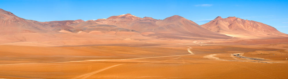 Road and paths in the altiplano at an altitude of 4600m, atacama desert, chile, south america