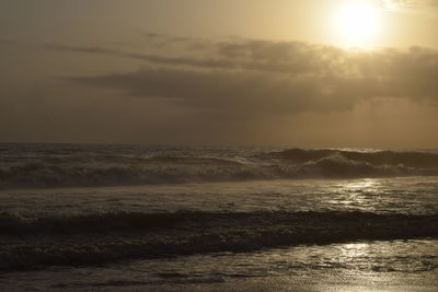 Scenic view of sea at sunset