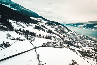 Scenic view of snowcapped mountains against sky