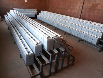High angle view of empty chairs on table