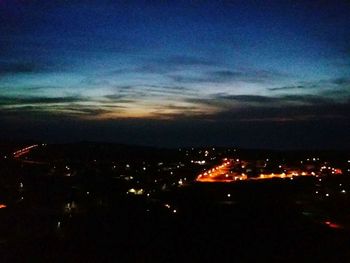 View of illuminated cityscape at night