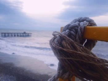 Close-up of rope against sea