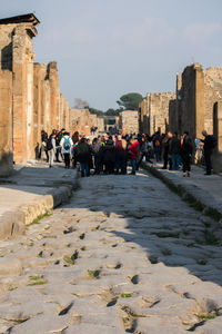 Group of people in front of historical building