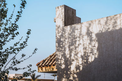 Low angle view of building against clear sky