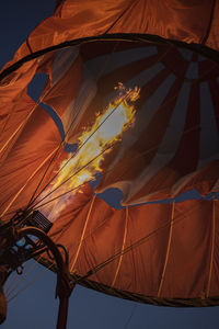 Low angle view of flame in hot air balloon 