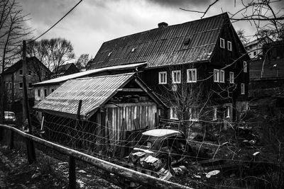 Exterior of abandoned building against sky