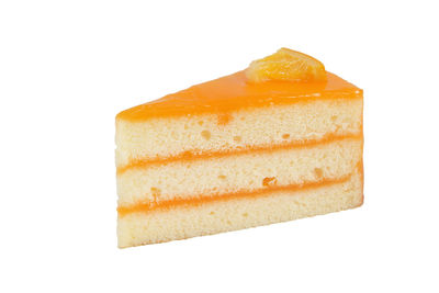 Close-up of cake against white background