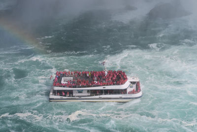 High angle view of ship sailing in sea