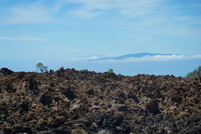 Scenic view of rock formations against sky