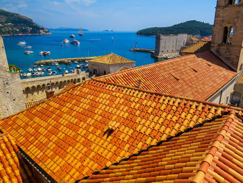 High angle view of townscape by sea