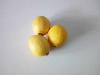 Close-up of fruits against white background