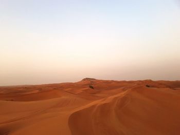 Scenic view of desert against clear sky