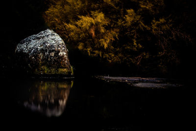 Scenic view of lake at night