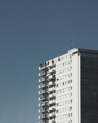 Low angle view of buildings against clear sky