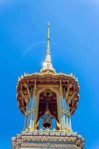 Low angle view of temple against blue sky