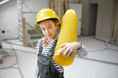 Portrait of man working in factory