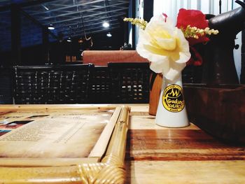 Close-up of flower vase on table