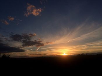 Scenic view of silhouette landscape against sky during sunset