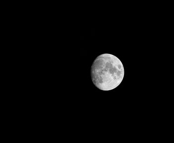 Low angle view of moon against clear sky