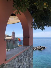 Built structure by sea against sky, tellaro