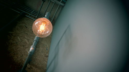 Close-up of illuminated light bulb