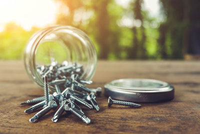 Close-up of glass jar on table