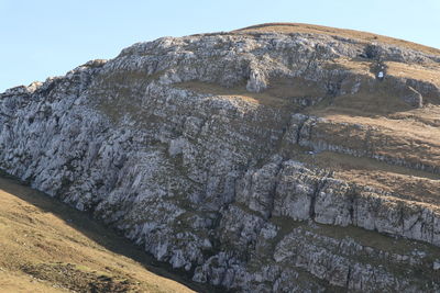 Scenic view of rocky mountains against sky