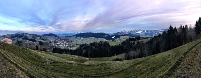 Panoramic view of landscape and mountains against sky