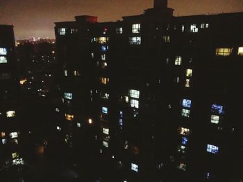 Buildings in city at night