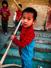 Portrait of boy standing