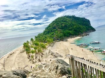 Scenic view of beach against sky
