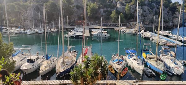 Boats moored at harbor in marseille, france 