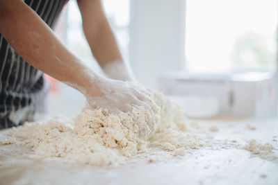 Close-up of person preparing food