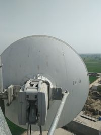 Close-up of airplane against sky