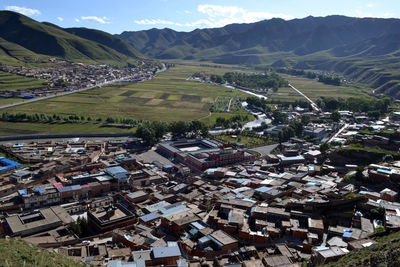 High angle view of townscape and houses against sky