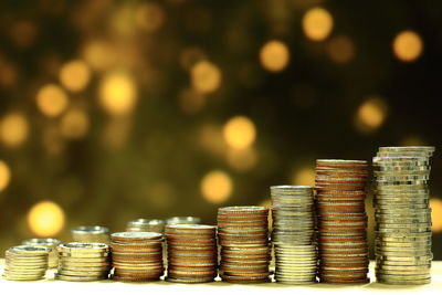 Close-up of coins on table