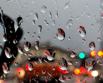 Full frame shot of wet window in rainy season