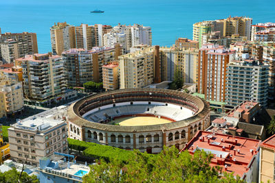 High angle view of buildings in city against sky