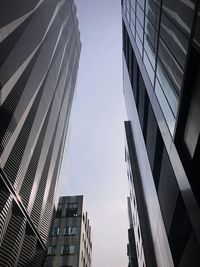 Low angle view of skyscrapers against sky