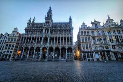 Early morning wide angle shot on the unesco heritage grand place with town hall, king's house 
