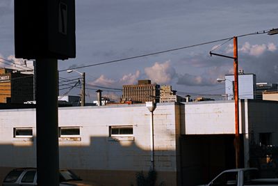 View of buildings against cloudy sky