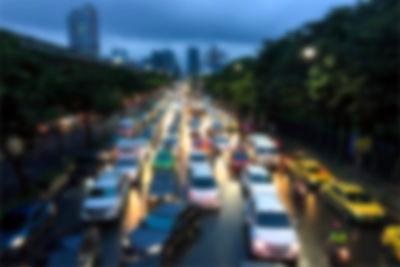 Defocused image of people on road