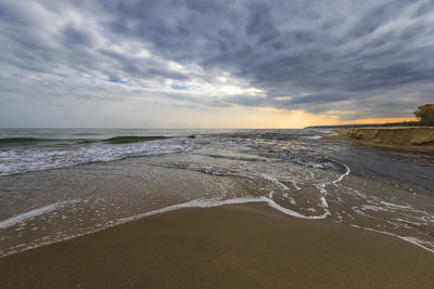 Scenic view of beach against sky