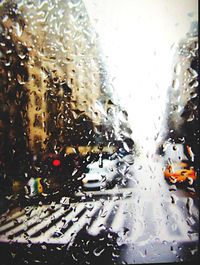 Close-up of water drops on car windshield