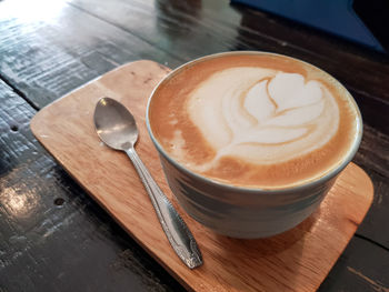 High angle view of cappuccino on table