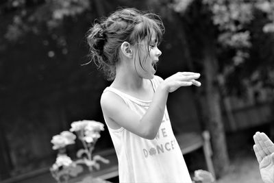 Young woman holding text